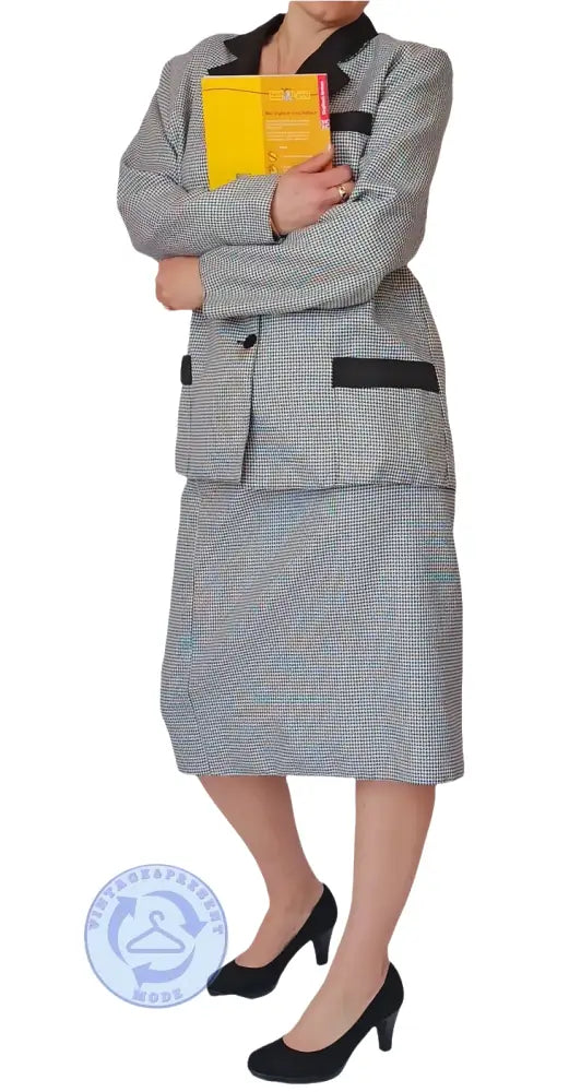 Klassisches graues Pepita Damenkostüm mit schwarzem Blazer und Rock